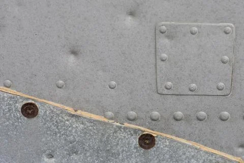 Metallic texture with rivets Stock Photos