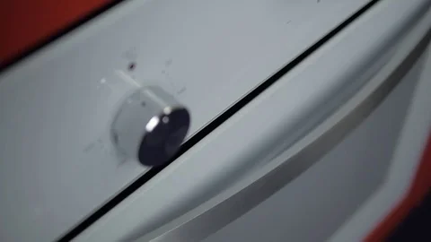 Metallic Toggle Switch of the Cooker Oven. Close-up View. Digital Clock of oven. Stock Footage 84830951