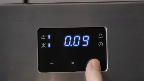 Metallic Toggle Switch of the Cooker Oven. Close-up View. Digital Clock of oven. Stock Footage 84831663