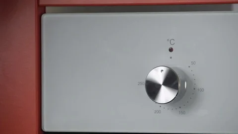 Metallic Toggle Switch of the Cooker Oven. Close-up View. Digital Clock of oven. Stock Footage 84831690