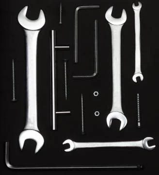 Metallic tools on a black background Stock Photos