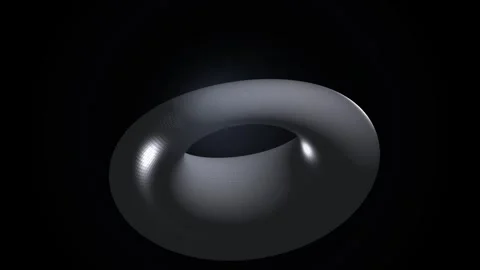 Metallic torus shape rotating on black background creating a dark minimal l.. Video stock 345984216