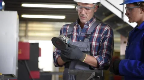 Metalwork apprentice training in workshop Video stock 67558729