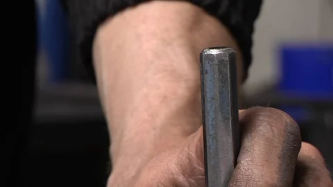 Metalwork Hammer Tapping Drill Holes In Stainless Steel Sheets Stock Footage 107748650