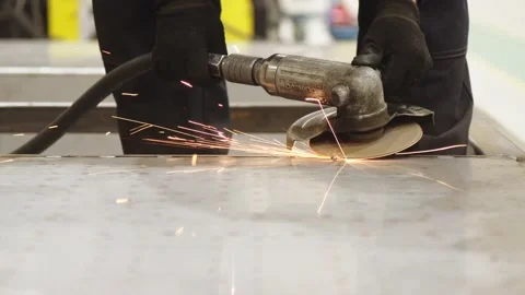 Metalwork processing at train car production plant. sparkling. close-up of Stock Footage 202049018