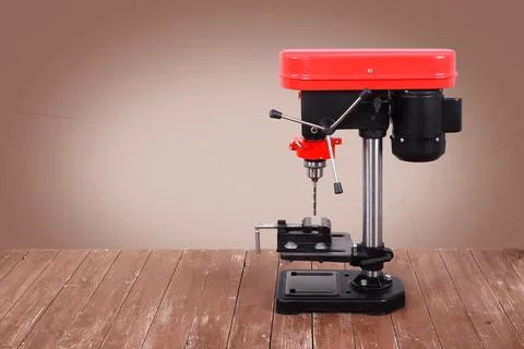 Metalwork tool - Side view Red new drill press Stock Photos