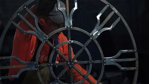 The metalworker compares the metal structure element welded with the drawings Video stock 136357356