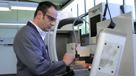 Metalworker operates CNC machine - 1 스톡 동영상 11899834