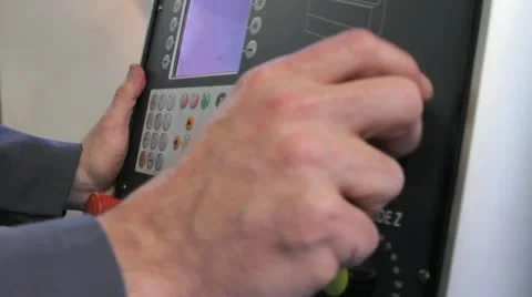 Metalworker operates CNC machine - closeup panel - 3 Stock-Footage 11899867