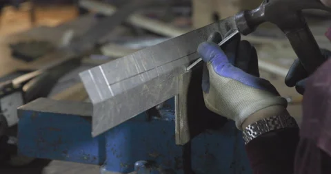 A metalworker preparing tool detail for installation Stock Footage 169794834