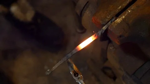 Metalworker Twisting Hot Steel to Create Twisted Metal Pattern on a Project Stock Footage 101500152