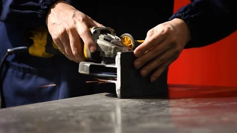 Metalworker at work with his grinder Stock Footage 125792329