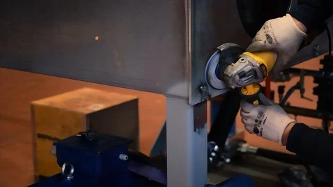 Metalworker at work with his grinder Stock Footage 125792899