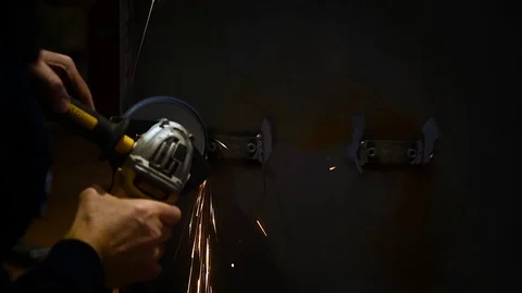 Metalworker at work with his grinder Stock Footage 125799001