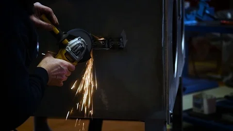 Metalworker at work with his grinder Stock Footage 125799374