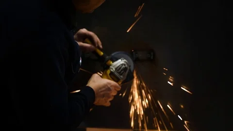 Metalworker at work with his grinder Stock Footage 125799872