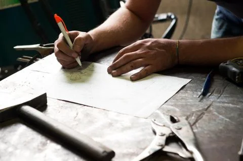Metalworker working on a project Stock Photos