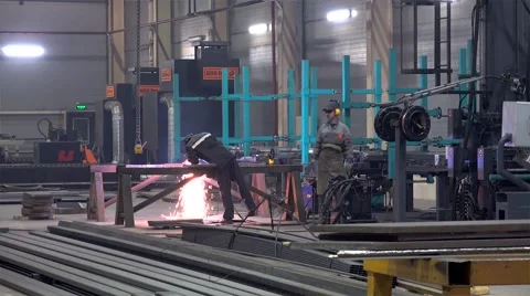 Metalworking with Angle Grinder at the Metal structures plant. Stock Footage