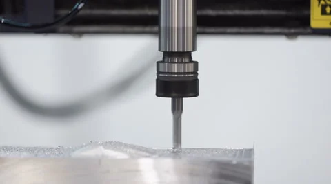 Metalworking CNC milling machine. Cutting metal modern processing technology. Stock Footage 61749598