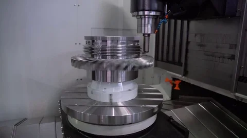 Metalworking CNC milling machine. Cutting metal modern processing technology. Stock Footage 82122332