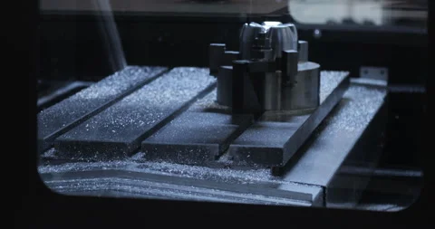 Metalworking CNC milling machine. Cutting metal modern processing technology. Stock Footage 87860832