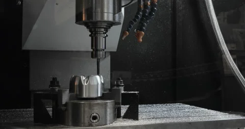 Metalworking CNC milling machine. Cutting metal modern processing technology. Stock Footage 87863998