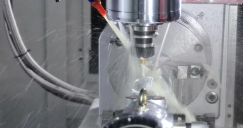 Metalworking CNC milling machine. Cutting metal modern processing technology. Stock Footage 154762197