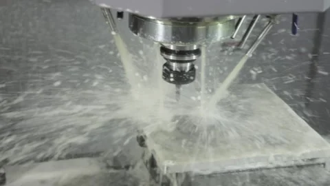 Metalworking CNC milling machine. Cutting metal modern processing technology. Stock Footage 159748924