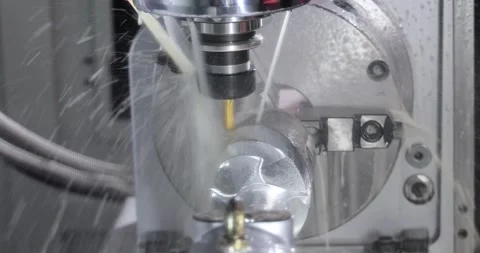 Metalworking CNC milling machine. Cutting metal modern processing technology. Stock Footage 159750446