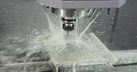 Metalworking CNC milling machine. Cutting metal modern processing technology. Stock Footage 165101192