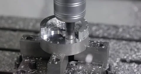 Metalworking CNC milling machine. Cutting metal modern processing technology. Stock Footage 165495907