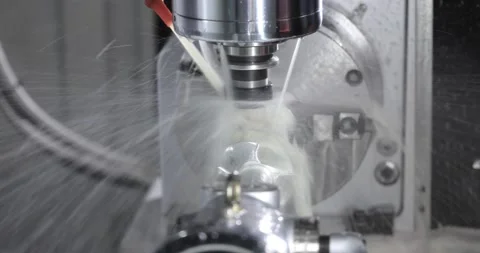 Metalworking CNC milling machine. Cutting metal modern processing technology. Stock Footage 191466144