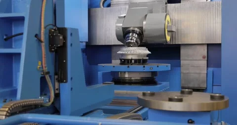 Metalworking CNC milling machine. Cutting metal modern processing technology. Stock Footage 228806977