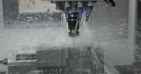 Metalworking CNC milling machine. Cutting metal modern processing technology. Stock Footage 240540784