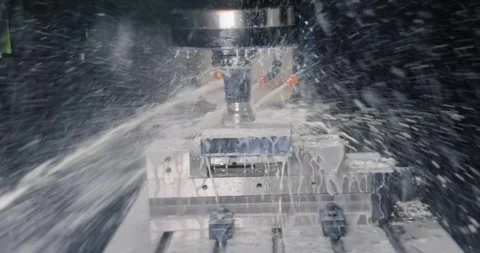 Metalworking CNC milling machine. Cutting metal modern processing technology. Stock Footage 242603718