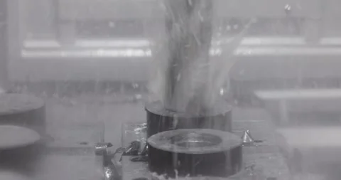 Metalworking CNC milling machine. Cutting metal modern processing technology. Stock Footage 242605078