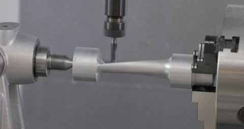 Metalworking CNC milling machine. Cutting metal modern processing technology. Stock Footage 242605749