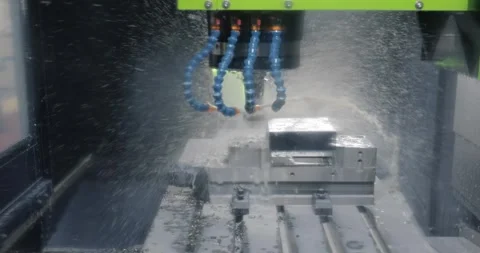 Metalworking CNC milling machine. Cutting metal modern processing technology. Stock Footage 251145366