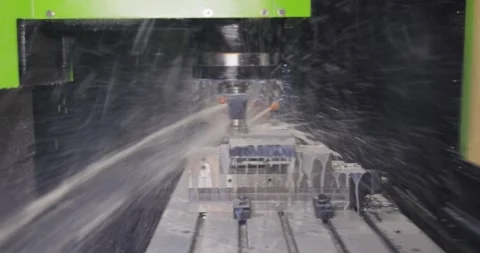 Metalworking CNC milling machine. Cutting metal modern processing technology. Stock Footage 255831967