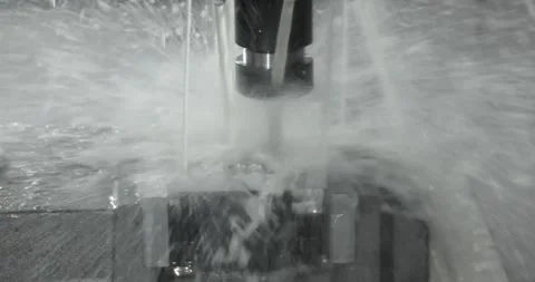 Metalworking CNC milling machine. Cutting metal modern processing technology. Stock Footage 261446111