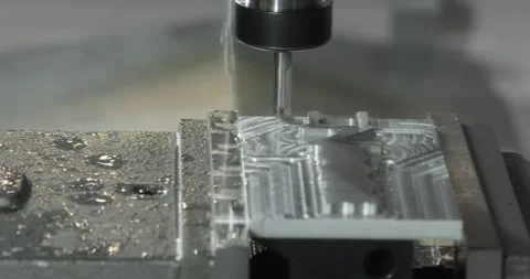 Metalworking CNC milling machine. Cutting metal modern processing technology. Stock Footage 264104275
