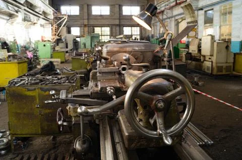 Metalworking workshop, metal processing machines. Levers of control of the machi Stock Photos