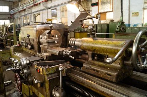 Metalworking workshop, metal processing machines. Levers of control of the machi Stock Photos