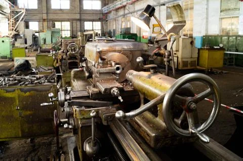 Metalworking workshop, metal processing machines. Levers of control of the machi Stock Photos
