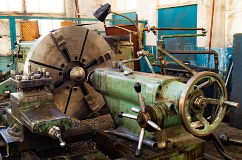 Metalworking workshop, metal processing machines. Levers of control of the machi Stock Photos
