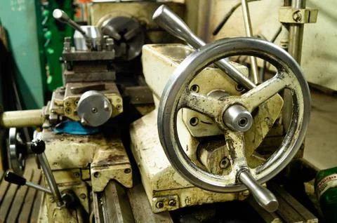 Metalworking workshop, metal processing machines. Levers of control of the machi Stock Photos