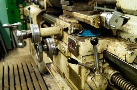 Metalworking workshop, metal processing machines. Levers of control of the machi Stock Photos
