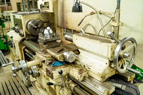 Metalworking workshop, metal processing machines. Levers of control of the machi Stock Photos