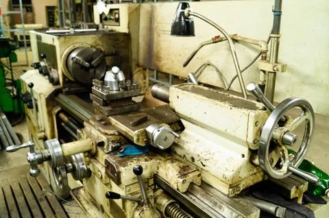 Metalworking workshop, metal processing machines. Levers of control of the machi Stock Photos