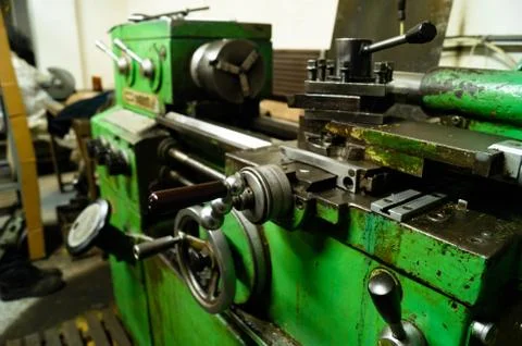 Metalworking workshop, metal processing machines. Levers of control of the machi Stock Photos